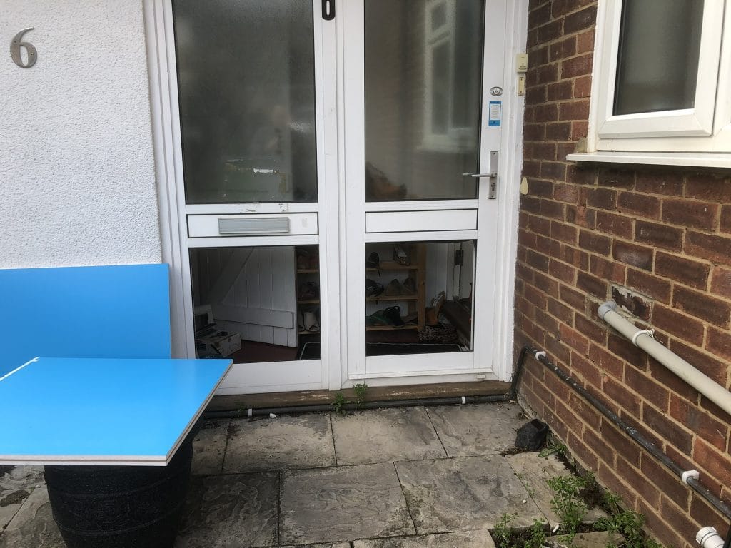 Cat flap been fitted in a UPVC panel in Brighton, Sussex