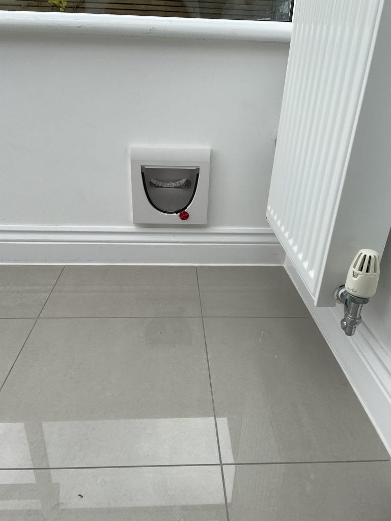Cat Flap fitted through wall in Surrey